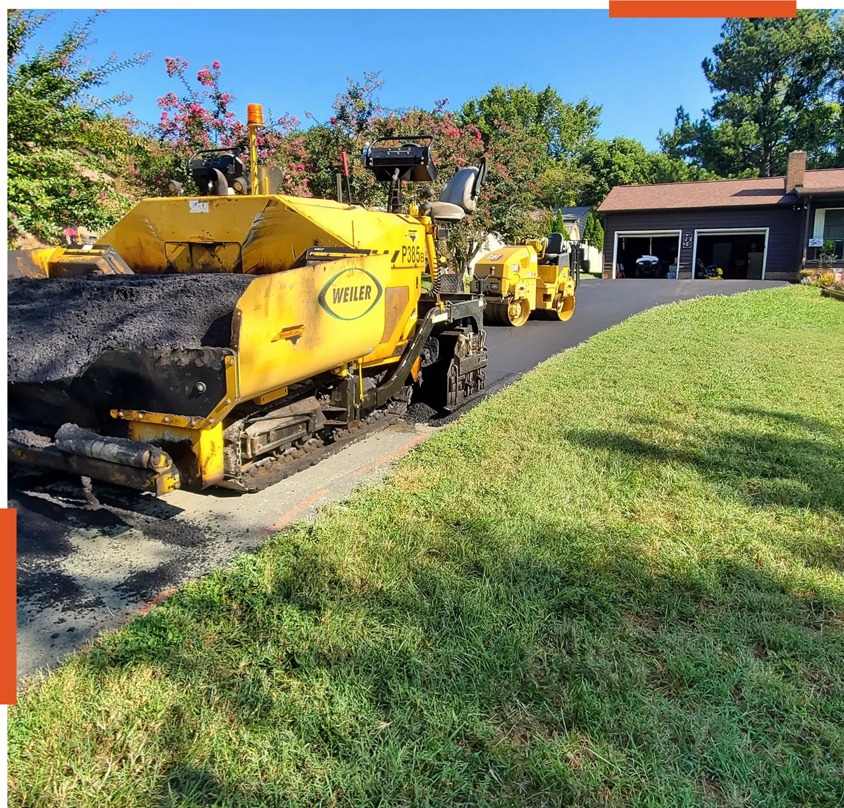 img (1) Asphalt paving machine on residential driveway.